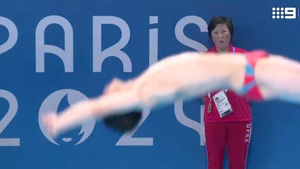 Im Yong Myong's coach was shocked at the dive.