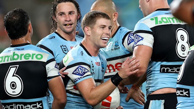 Blayke Brailey of the Sharks celebrates with team mates.