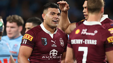 David Fifita celebrates with team mates after scoring a try.