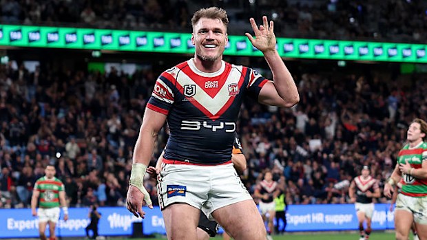 Angus Crichton of the Roosters celebrates after scoring a try.