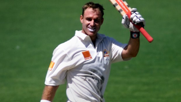 Matthew Hayden acknowledges his century against South Africa at the Adelaide Oval in 2001.