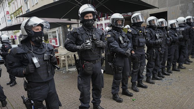 Riot police swoop on battling football fans ahead of Euro 2024 clash in ...