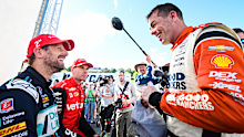 Romain Grosjean (left) with Grand Prix of Alabama winner Scott McLaughlin (right).