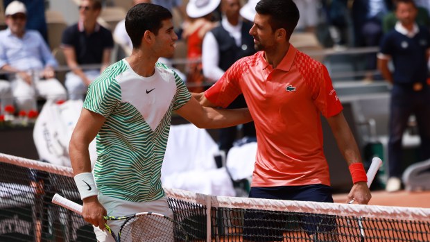 Novak Djokovic R of Serbia greets Carlos Alcaraz of Spain prior to the men's singles semifinals between Novak Djokovic of Serbia and Carlos Alcaraz of Spain at the French Open tennis tournament at Roland Garros in Paris, France, June 9, 2023. (Photo by Gao Jing/Xinhua via Getty Images)