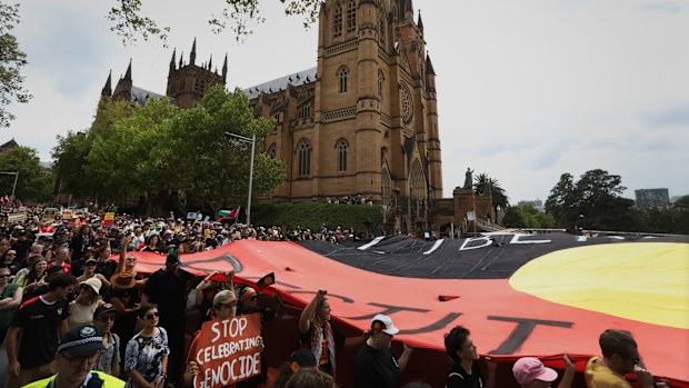 SYDNEY, AUSTRALIA - JANUARY 26: First Nations people and supporters take part in a Invasion Day protest in the central business district (CBD) on January 26, 2026 in Sydney, Australia.  Australia Day, formerly known as Foundation Day, is the official national day of Australia and is celebrated annually on January 26 to commemorate the arrival of the First Fleet to Sydney in 1788. Many indigenous Australians refer to the day as 'Invasion Day' and there is a small but growing movement to change th