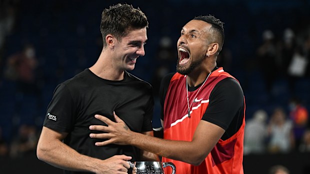 Thanasi Kokkinakis (left) and Nick Kyrgios after winning their men's doubles final match against Matthew Ebden and Max Purcell in the 2022 Australian Open.