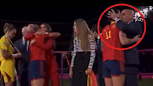 Spain midfielder Jenni Hermoso is kissed by Spanish football federation president Luis Rubiales.