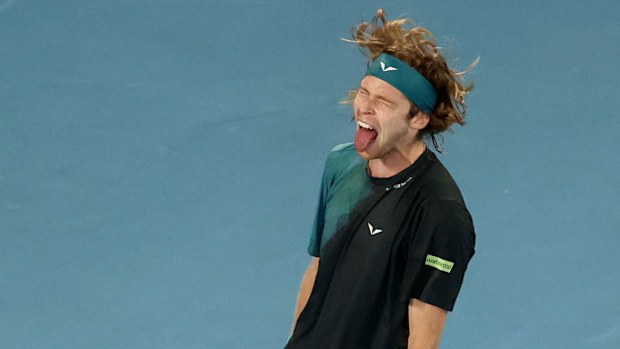 Andrey Rublev reacts at Melbourne Park.