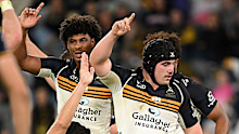Brumbies players celebrate after Luke Reimer scored a try.