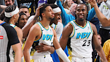 Tyrese Haliburton #0 of the Indiana Pacers celebrating with teammates