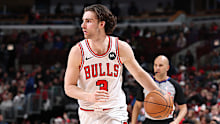Josh Giddey of the Chicago Bulls dribbles the ball.