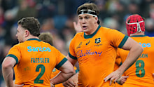 Tom Hooper of Australia interacts with teammate Matt Faessler.