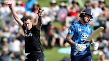 Blair Tickner of New Zealand celebrates his wicket of Brydon Carse of England.
