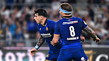 Italian players celebrate.