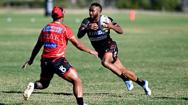 Hamiso Tabuai-Fidow runs with the ball during a Dolphins NRL training session at Kayo Stadium on February 03, 2023 in Brisbane, Australia. (Photo by Bradley Kanaris/Getty Images)