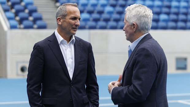 Andrew Abdo chats with Craig Tiley at Tennis Australia.