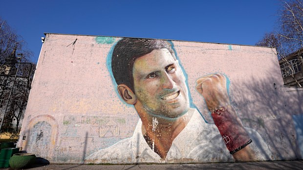 A mural depicting Serbian tennis player Novak Djokovic on a wall in Belgrade, Serbia.
