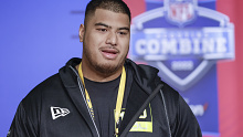 INDIANAPOLIS, IN - MAR 03: Daniel Faalele #OL15 of the Minnesota Golden Gophers speaks to reporters during the NFL Draft Combine at the Indiana Convention Center on March 3, 2022 in Indianapolis, Indiana. (Photo by Michael Hickey/Getty Images)