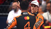 Oscar Piastri and Lando Norris (4) talk after the sprint race at the 2025 Miami Grand Prix.