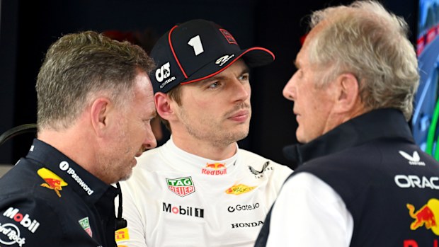 Christian Horner, Team Principal of Oracle Red Bull Racing, Max Verstappen of the Netherlands and Oracle Red Bull Racing, and Dr Helmut Marko, Team Consultant of Oracle Red Bull Racing talk in the garage during practice ahead of the F1 Grand Prix of Australia at Albert Park Grand Prix Circuit on March 14, 2025 in Melbourne, Australia. (Photo by Mark Sutton - Formula 1/Formula 1 via Getty Images)