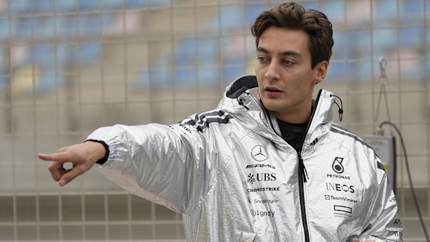 Mercedes driver George Russell of Britain stands in the pit lane during a Formula One pre-season test at the Bahrain International Circuit in Sakhir, Bahrain, Wednesday, Feb. 26, 2025. (AP Photo/Darko Bandic)