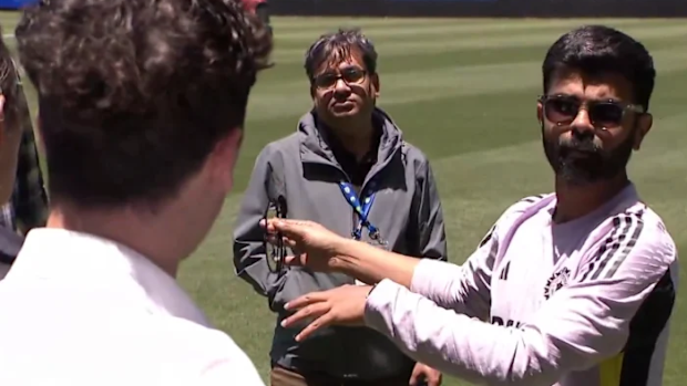 Indian team media manager Moulin Parikh clashes with members of Australian media.