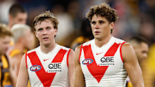 James Jordon (left) and Charlie Curnow look dejected.