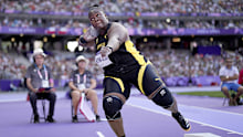 Danniel Thomas-Dodd, of Jamaica, competes during the women's shot put qualification.