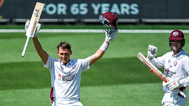 Marnus Labuschagne of the Queensland Bulls celebrates bringing up his century.