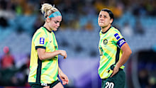 Sam Kerr reacts with teammate Ellie Carpenter.