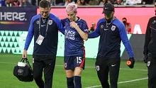 Megan Rapinoe leaves the game after being injured.
