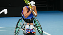 Dylan Alcott of Australia reacts during his match against Sam Schroder of the Netherlands in the final of the quad wheelchair singles final at the Australian Open tennis championships in Melbourne, Australia, Thursday, Jan. 27, 2022. (AP Photo/Simon Baker)