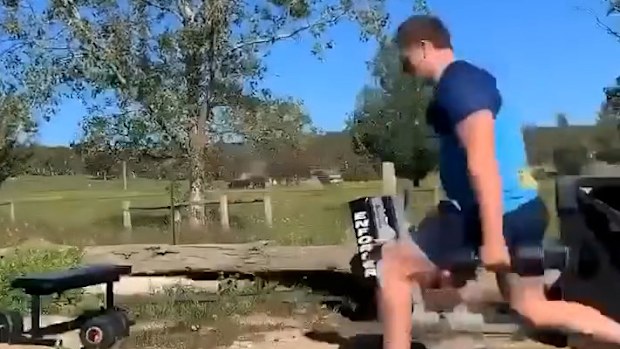 Waratahs and Wallabies prop Angus Bell putting in the hard yards at his family farm in Bungendore.