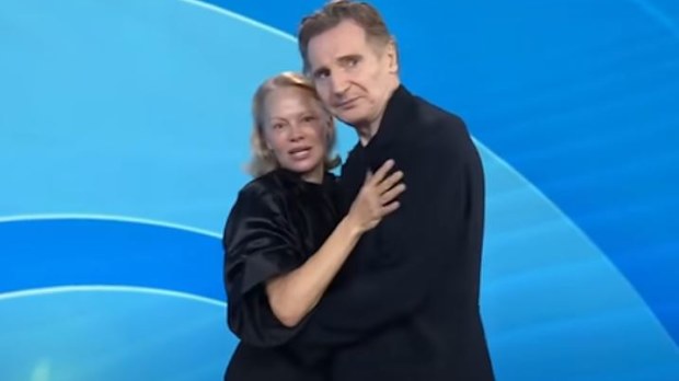 Pamela Anderson and Liam Neeson stage a kiss on the US Today Show