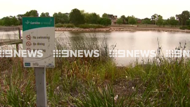 Police have drained a lake in Caroline Springs as part of an investigation into an 'air traffic interference'. (9NEWS)