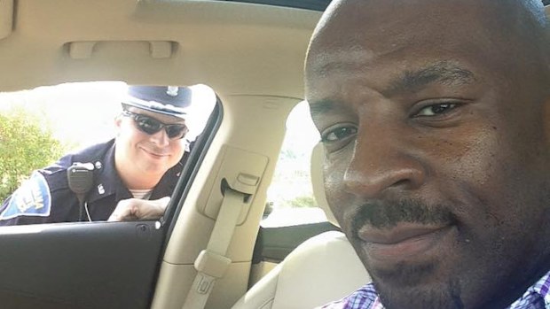 Greg Barnes Jr's friendly selfie with a police officer has won the praise of several Facebook users. (Facebook/Greg Barnes Jr)