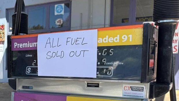 Member for Wagga Wagga Dr Joe McGirr stands by Batlow service station, which has run out of fuel.