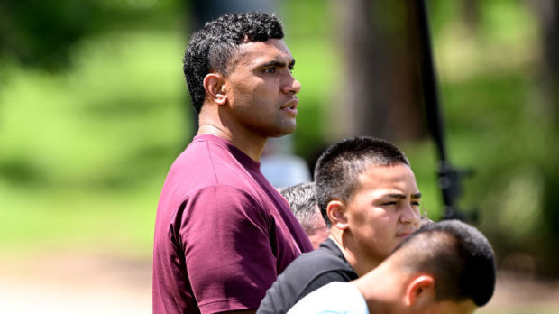 Tevita Pangai Junior watches a Broncos training session at Red Hill.
