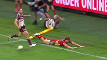Tom Trbojevic collides with a cameraman in the Dolphins v Sea Eagles match on Thursday, May 9, 2024.