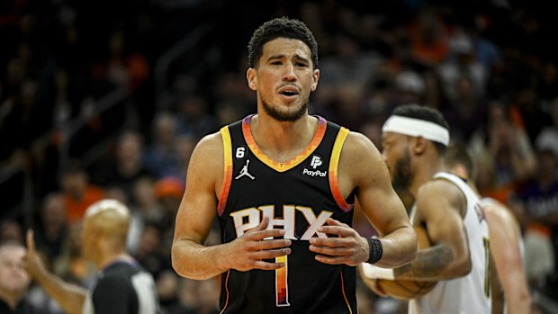 PHOENIX, AZ - MAY 11: Devin Booker (1) of the Phoenix Suns reacts to a call during the first quarter against the Denver Nuggets at Footprint Center in Phoenix on Thursday, May 11, 2023. (Photo by AAron Ontiveroz/The Denver Post)