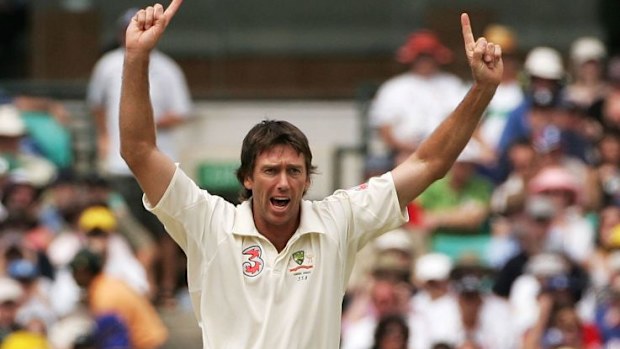 Glenn McGrath of Australia celebrates taking the wicket of Paul Collingwood of England.
