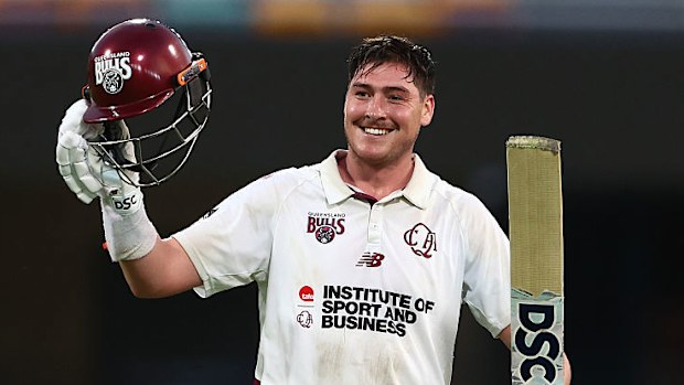 Matt Renshaw of Queensland celebrates 100 runs in the Sheffield Shield against Victoria.