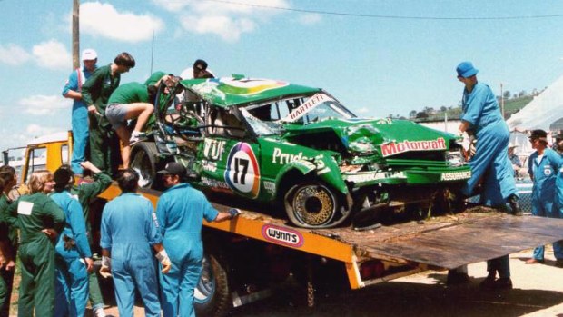 Dick Johnson's car returned to the pits on the back of a flatbed after his enormous crash during the Hardies Heroes ahead of the 1983 Bathurst 1000.