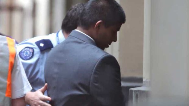 James Stoneham is led into the Supreme Court in 2013.