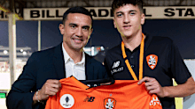 Tim Cahill with his son Shae.