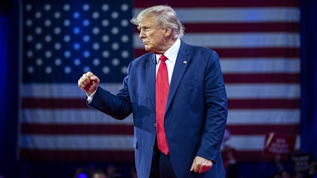 Former President Donald Trump pumps his fist as he departs after speaking at the Conservative Political Action Conference, CPAC 2023, Saturday, March 4, 2023, at National Harbor in Oxon Hill, Md. 