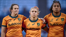  Shannon Parry, Georgina Friedrichs and Adiana Talakai of the Wallaroos stand for the anthems during the Women's International match between the Australia Wallaroos and Fijiana at Allianz Stadium on May 20, 2023 in Sydney, Australia. (Photo by Brett Hemmings/Getty Images)