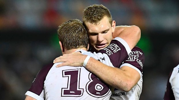 Jake Trbojevic and Tom Trbojevic of the Sea Eagles embrace.