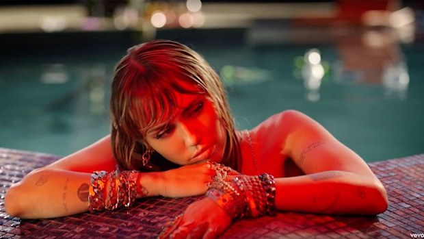 Miley Cyrus is the music video for Slide Away