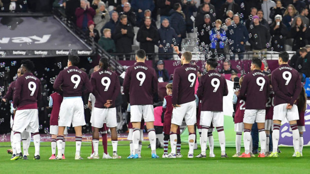 West Ham United players wearing tops in support of Mikel Antonio.